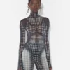 Re-Edition – the Black & White Dots Print Mesh Top