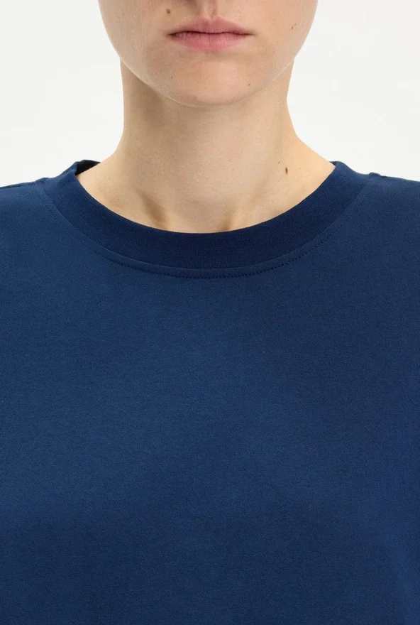 The Long-Sleeved Twisted Bodysuit The Long-Sleeved Twisted Bodysuit